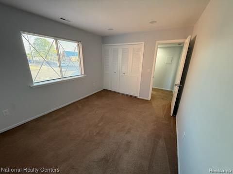 8160 Crestview Dr, Sterling Heights, MI 48312 - unfurnished bedroom with carpet flooring and a closet