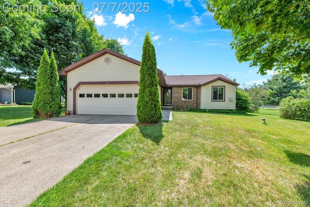 3447 Woodvalley Dr, Lapeer, MI 48446 - ranch-style house with a garage, concrete driveway, and a front lawn