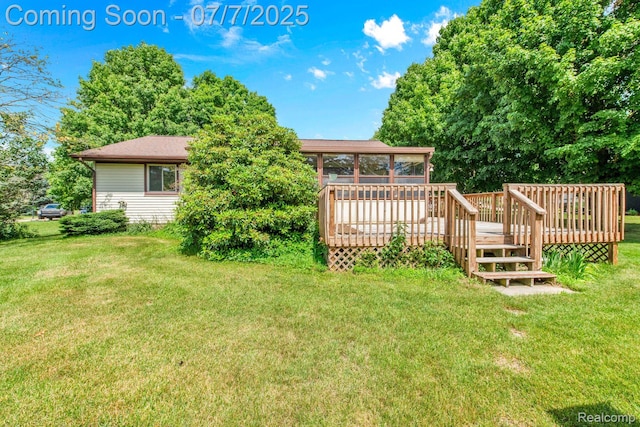 3447 Woodvalley Dr, Lapeer, MI 48446 - view of grassy yard featuring a deck