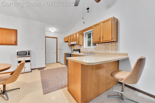 3447 Woodvalley Dr, Lapeer, MI 48446 - kitchen with white appliances, under cabinet range hood, a ceiling fan, light countertops, and decorative backsplash