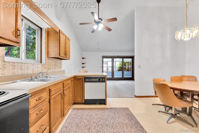 3447 Woodvalley Dr, Lapeer, MI 48446 - kitchen with white dishwasher, a peninsula, light countertops, a chandelier, and a ceiling fan