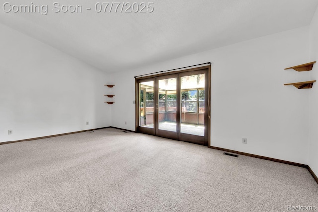 3447 Woodvalley Dr, Lapeer, MI 48446 - empty room with carpet and vaulted ceiling