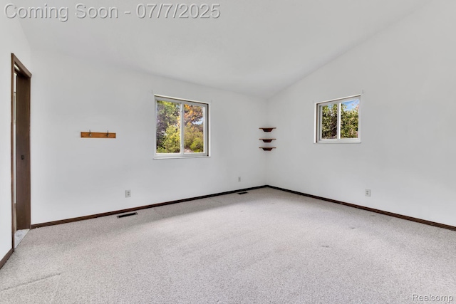 3447 Woodvalley Dr, Lapeer, MI 48446 - carpeted spare room with lofted ceiling and baseboards