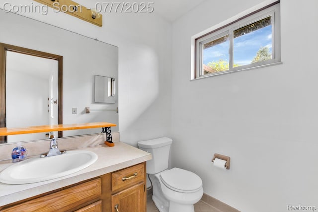3447 Woodvalley Dr, Lapeer, MI 48446 - bathroom featuring vanity and tile patterned flooring