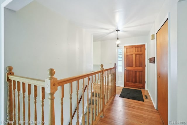 4220 England Beach Rd, White Lake, MI 48383 - foyer entrance featuring light wood-style flooring