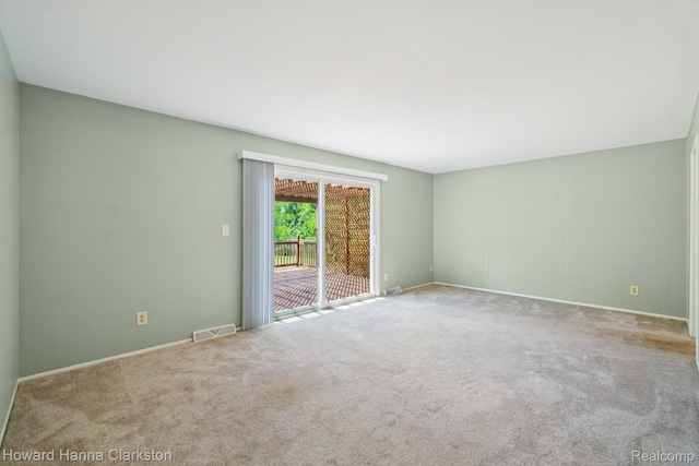 4220 England Beach Rd, White Lake, MI 48383 - unfurnished room with carpet and baseboards