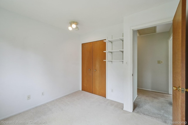 4220 England Beach Rd, White Lake, MI 48383 - unfurnished bedroom with carpet floors and a closet