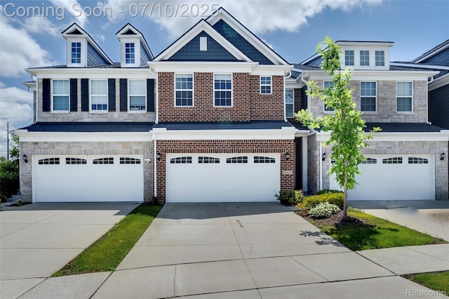 43433 Chancellor Ln, Novi, MI 48375 - view of front of home with a garage, stone siding, concrete driveway, and brick siding