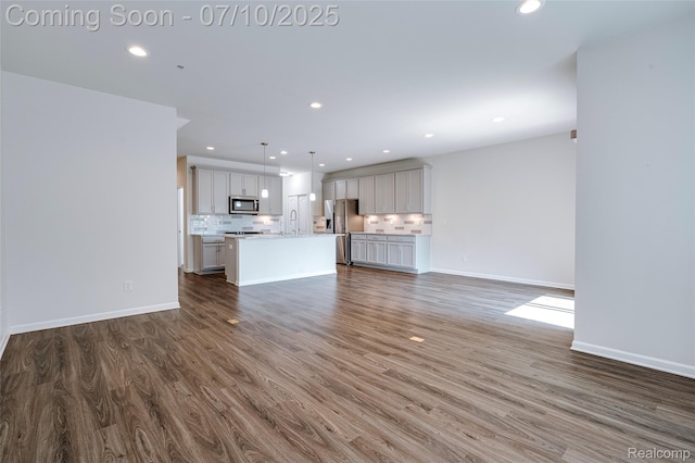 43433 Chancellor Ln, Novi, MI 48375 - unfurnished living room featuring wood finished floors and recessed lighting