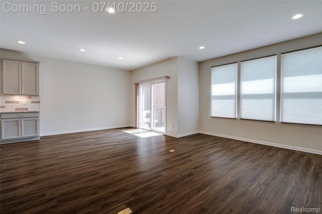 43433 Chancellor Ln, Novi, MI 48375 - unfurnished living room featuring dark wood-type flooring and recessed lighting