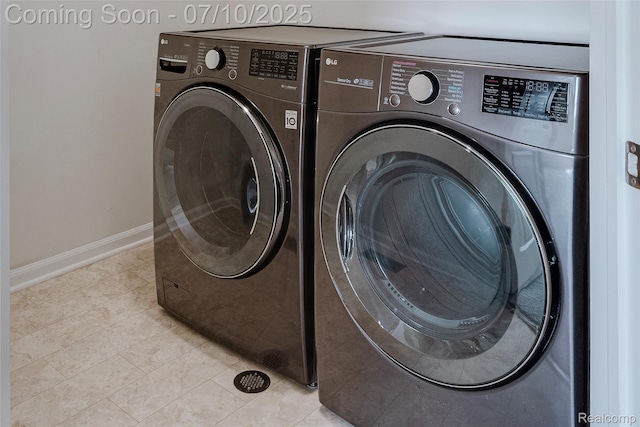 43433 Chancellor Ln, Novi, MI 48375 - laundry area with separate washer and dryer and light tile patterned floors