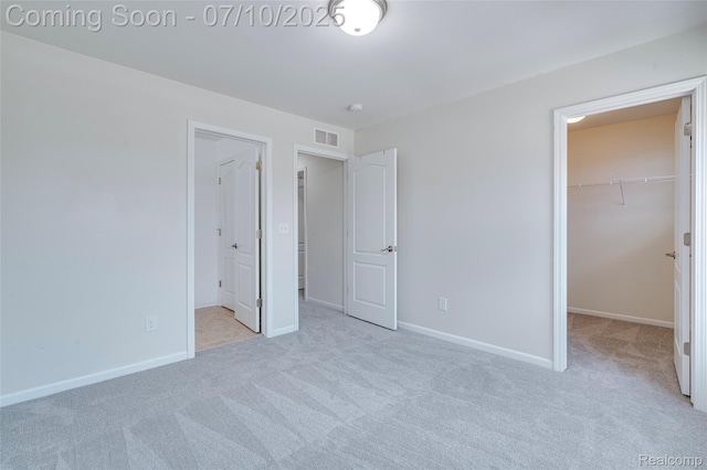 43433 Chancellor Ln, Novi, MI 48375 - unfurnished bedroom with carpet floors, a spacious closet, and a closet
