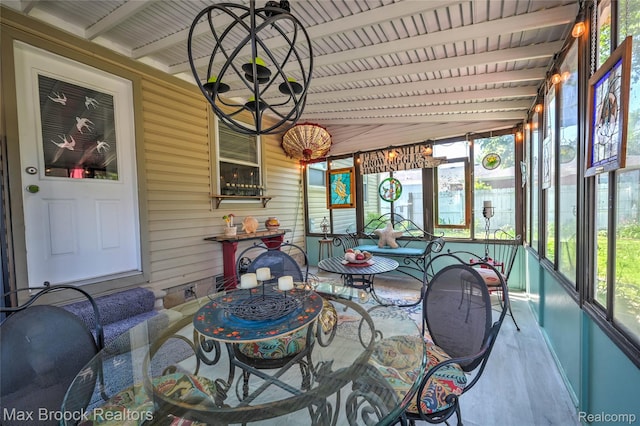 2233 Kohler St, Waterford, MI 48329 - sunroom / solarium with beam ceiling and a chandelier