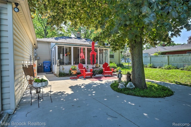 2233 Kohler St, Waterford, MI 48329 - view of patio featuring a sunroom