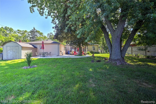 2233 Kohler St, Waterford, MI 48329 - view of yard with a storage shed and a patio area