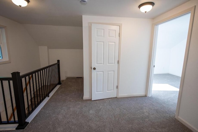 1120 8th St, Three Rivers, MI 49093 - corridor with carpet, an upstairs landing, and vaulted ceiling