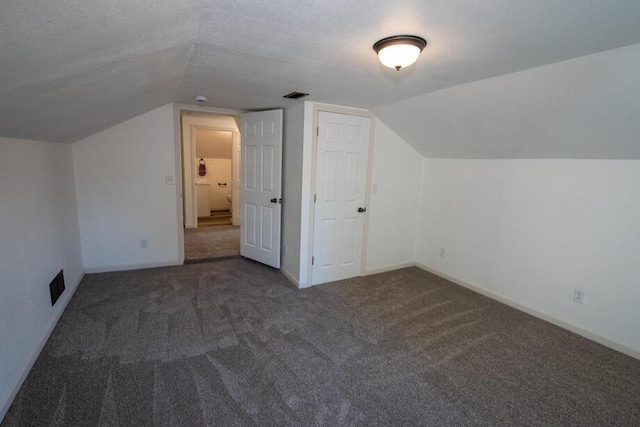 1120 8th St, Three Rivers, MI 49093 - bonus room featuring carpet floors and vaulted ceiling