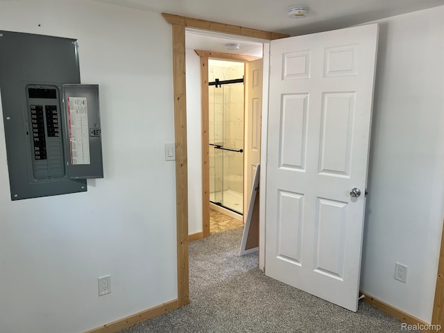 221 Bluegill Lake Dr, Frost, MI 48625 - corridor with electric panel, carpet, and a barn door