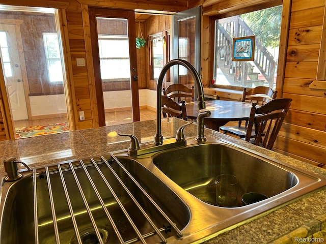 221 Bluegill Lake Dr, Frost, MI 48625 - kitchen view of wood walls and a sink