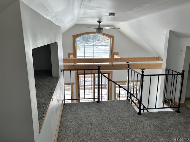 221 Bluegill Lake Dr, Frost, MI 48625 - hallway featuring an upstairs landing, vaulted ceiling, and carpet