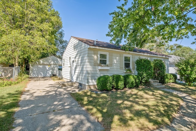 3061 Homewood St SW, Grandville, MI 49418 - ranch-style house with a detached garage and an outbuilding