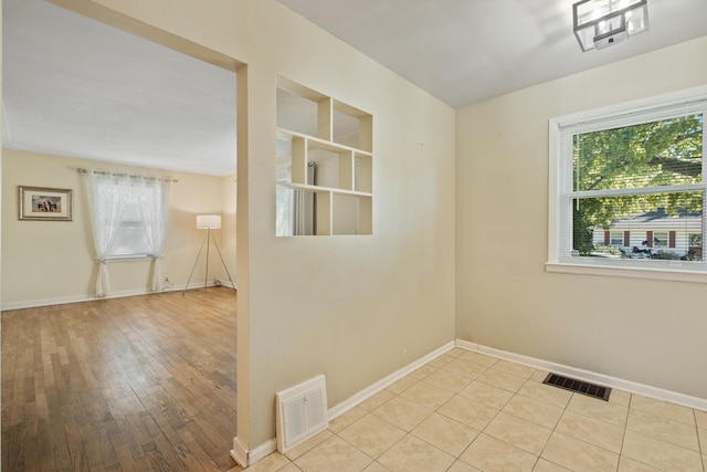 3061 Homewood St SW, Grandville, MI 49418 - unfurnished room with baseboards and wood finished floors