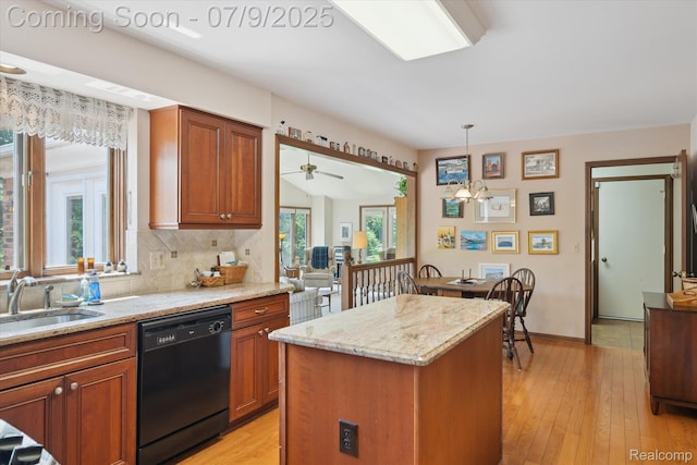 48721 W Normandy Ct, Plymouth, MI 48170 - kitchen featuring dishwasher, decorative backsplash, a chandelier, light stone countertops, and decorative light fixtures