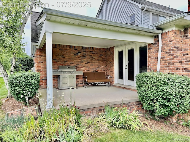 48721 W Normandy Ct, Plymouth, MI 48170 - view of patio featuring a grill and french doors