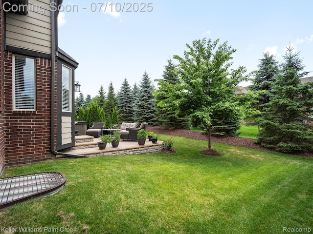 62777 Franklin Park Dr, Washington, MI 48094 - view of grassy yard featuring an outdoor living space and a patio
