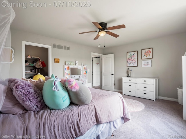 62777 Franklin Park Dr, Washington, MI 48094 - carpeted bedroom with baseboards and ceiling fan