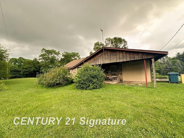 2410 Jossman Rd, Holly, MI 48442 - view of home's exterior with a yard