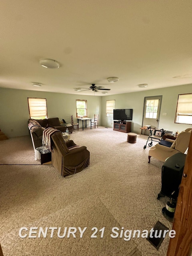 2410 Jossman Rd, Holly, MI 48442 - living room with carpet floors and a ceiling fan