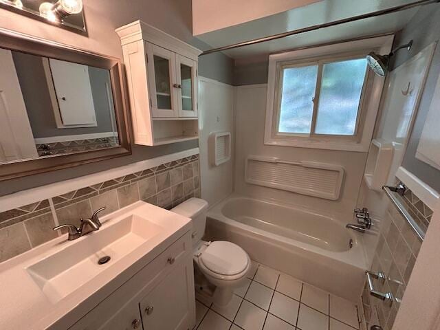 26219 Clarita St, Redford, MI 48240 - bathroom featuring tile patterned floors, tub / shower combination, vanity, and tasteful backsplash