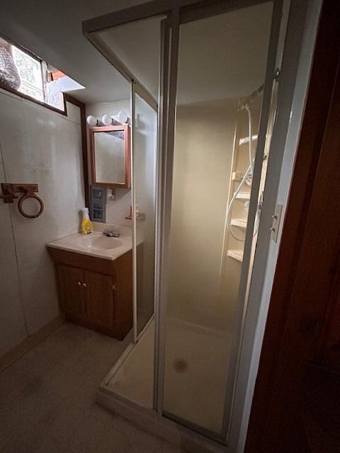 26219 Clarita St, Redford, MI 48240 - full bathroom with vanity and a shower stall
