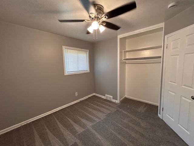 26219 Clarita St, Redford, MI 48240 - unfurnished bedroom featuring dark colored carpet, a closet, and ceiling fan