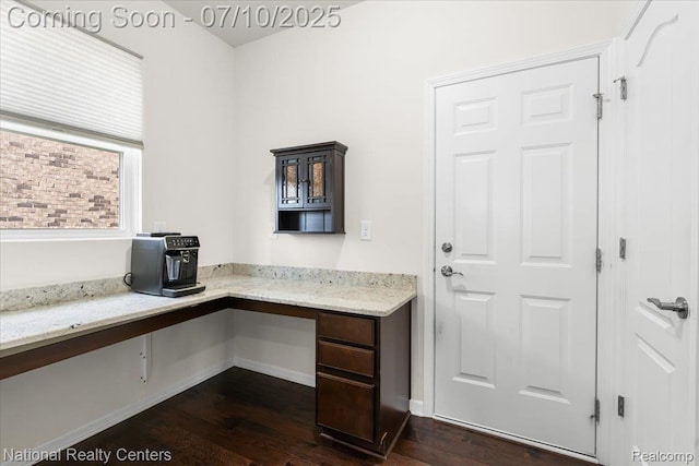 28049 Hummingdale Cir, Novi, MI 48377 - unfurnished office with built in desk and dark wood-type flooring