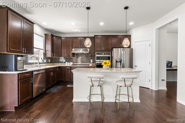 28049 Hummingdale Cir, Novi, MI 48377 - kitchen with appliances with stainless steel finishes, extractor fan, dark wood-style flooring, backsplash, and recessed lighting