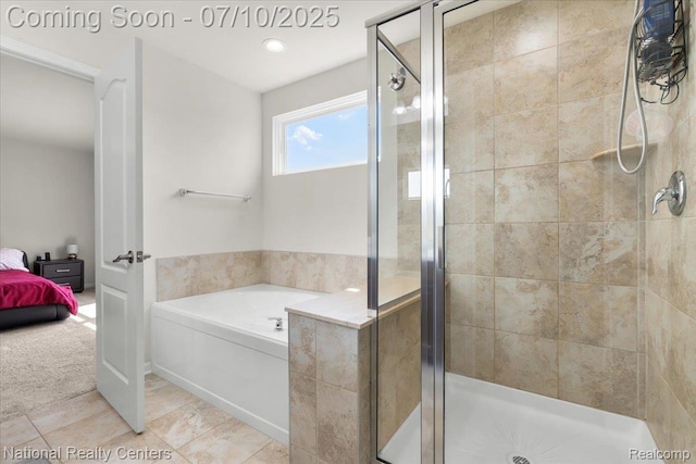 28049 Hummingdale Cir, Novi, MI 48377 - ensuite bathroom featuring a bath, a shower stall, and tile patterned flooring
