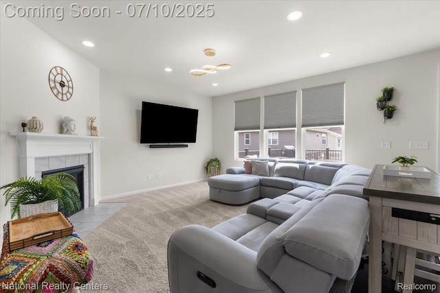 28049 Hummingdale Cir, Novi, MI 48377 - carpeted living room featuring recessed lighting, a fireplace, and a chandelier
