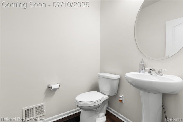 28049 Hummingdale Cir, Novi, MI 48377 - bathroom featuring toilet and baseboards