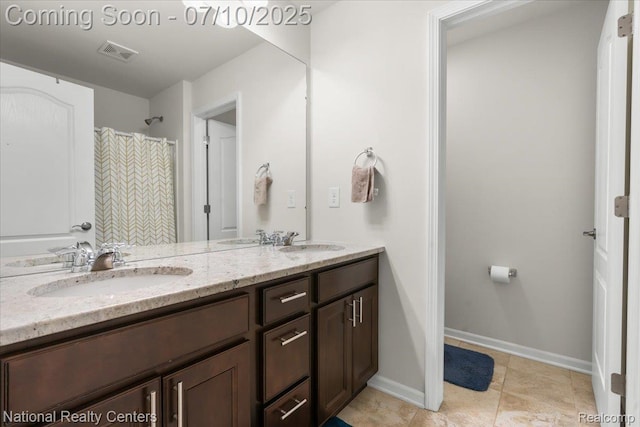 28049 Hummingdale Cir, Novi, MI 48377 - bathroom featuring double vanity and baseboards