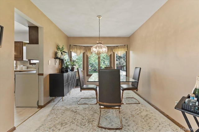 42109 Hartford Dr, Canton, MI 48187 - dining room with washer / clothes dryer and a chandelier