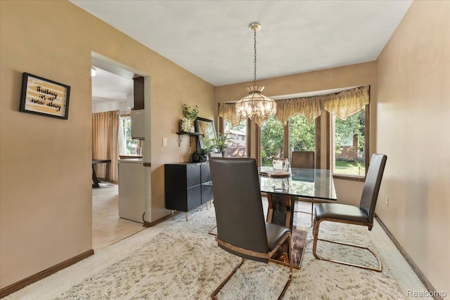 42109 Hartford Dr, Canton, MI 48187 - dining area featuring a chandelier and carpet floors