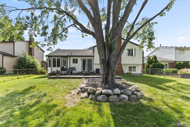 42109 Hartford Dr, Canton, MI 48187 - back of house featuring a fenced backyard and a patio