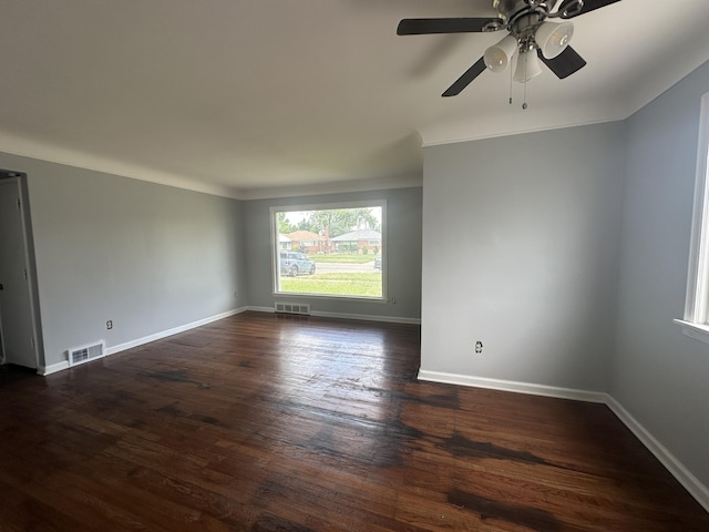 20523 Burt Rd, Detroit, MI 48219 - empty room with dark wood finished floors and a ceiling fan