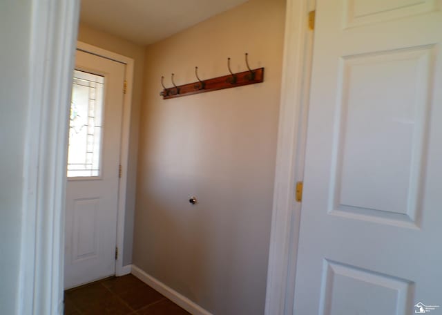 3380 Stewart Rd, Monroe, MI 48162 - entryway with dark tile patterned floors and baseboards