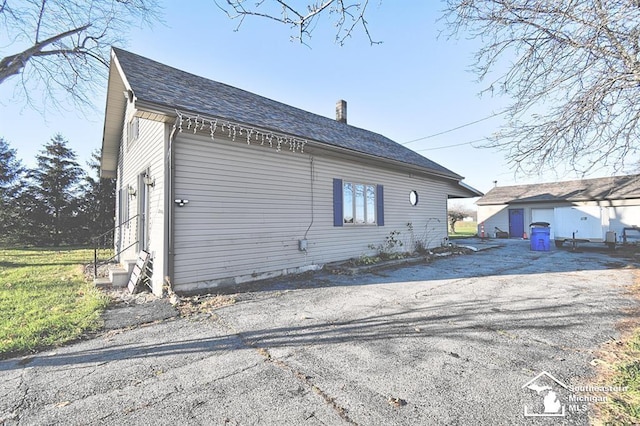 3380 Stewart Rd, Monroe, MI 48162 - view of property exterior featuring entry steps