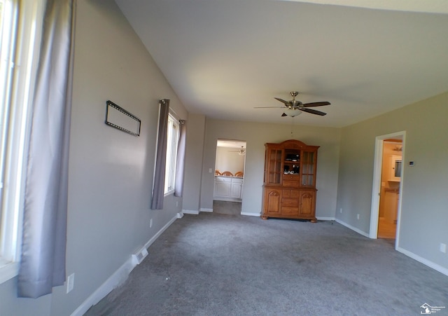 3380 Stewart Rd, Monroe, MI 48162 - unfurnished living room featuring a ceiling fan and carpet floors