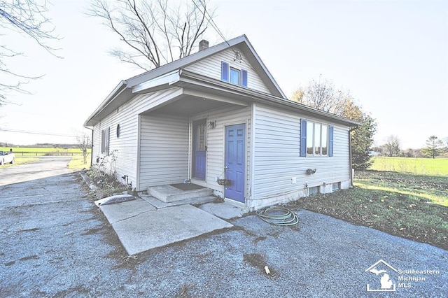 3380 Stewart Rd, Monroe, MI 48162 - view of front of property with a chimney