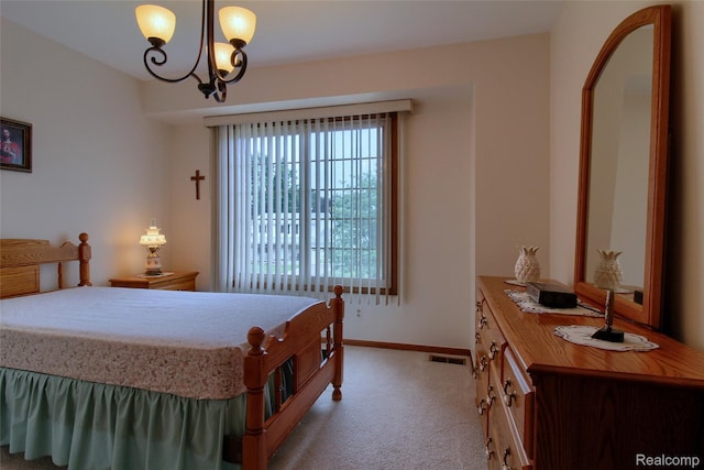 38188 Mallory Dr, Livonia, MI 48154 - bedroom with light colored carpet and a chandelier